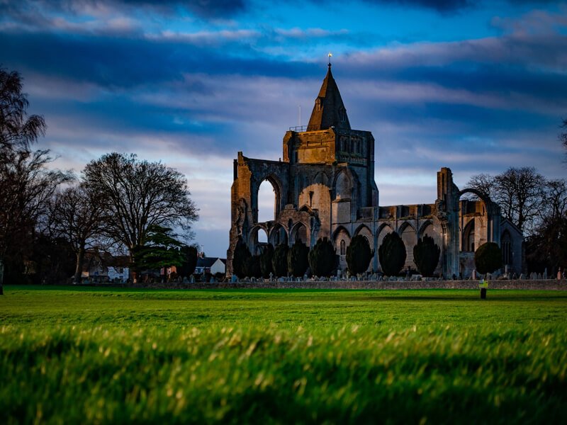 Beautiful view of the crowland abbey from snowden field on a cloudy day