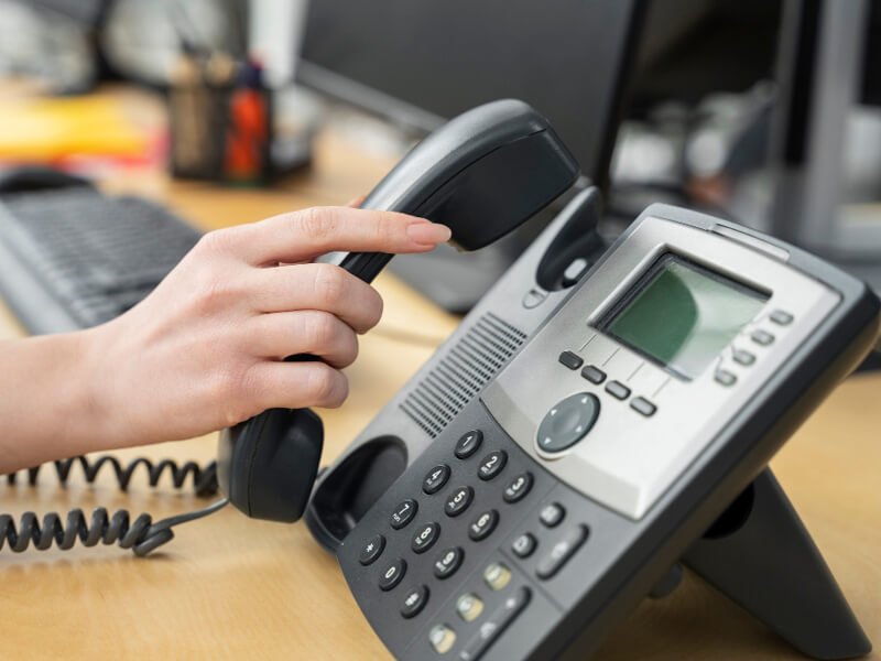 Close up on person working in call center