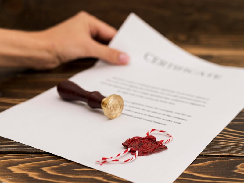 Graduation diploma certificate and wax seal